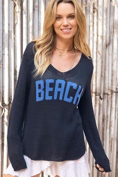 This top selling relaxed-fit v is the perfect beach sweater. There is a reason that it is in everyone's cart! Light, soft, ropey cotton V with knit-in lettering. Flattering, curved shirt-tail hems with side slits complement all body types. Airy, loose construction keeps you comfortable even in warmer weather. Light enough to tuck, or half tuck to create that easy effortless look. Throw it over your bathing suit for a day at the beach. Measurements for S/M: Chest Width (1" down from armholes): 22 Beach Cover Up Crochet, Cover Up Crochet, Knit Beach Dress, Beach Pareo, Beach Sweater, Neck Cover, Knit V Neck, Crochet Tunic, Cover Beachwear