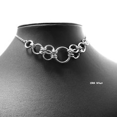 Linked O Rings Choker Chain Maille Links Handmade Stainless Steel Necklace Handcrafted Using Stainless Steel Chainmail Rings Woven In A Fun, Multi-Links Chain, Includes O Ring Center With Smaller Rings On Each Side. They Remind Me Of Bubbles, Did You Try To Catch Yours? Is Was Not My Intention When I Made It But Now It Just Makes Me Smile. Chain Width Is About 17mm. Width Of Design Links Is Just Shy Of 3 1/2". Total Length Is An Adjustable 16" To 16.5" To Fit Your Neck Or Boot Just Right. I Will Homemade Chain Necklaces, Jump Ring Jewelry Necklaces, Jump Ring Jewelry Wire, Chainmaille Jewelry Tutorial, Chain Maille Jewelry Patterns, Chainmail Ring Patterns, Chainmail Patterns Necklaces, Making Chains From Wire, Chain Maille Patterns Fire Mountain Gems And Beads