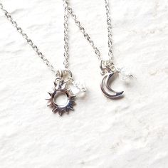 Sun and Moon necklace set. A silver plated sun and moon charm is accompanied by a natural crystal quartz bead. Hung on Sterling Silver chain.Chains pictured are 18 and 25 inches (45.7 and 63.5cm).Sun, moon and star charms measure 1/2 inch tall (12mm).Also available in gold: https://etsy.me/3e1RudZMore Best Friends necklaces: http://etsy.me/29jm5WK>>>Packaging<<>>Shipping Policy<<>>Good Vibes Refund Policy<<>>Repairs<<>>For International Cu Matching Sun And Moon Jewelry, Dainty Silver Moon Shaped Jewelry, Spiritual Silver Necklaces For Friendship, Celestial Silver Jewelry For Gifts, Celestial Style Silver Jewelry For Gifts, Sterling Silver Celestial Pendant Charm Necklace, Spiritual Pendant Jewelry For Best Friend Gift, Moonstone Sun And Moon Pendant Jewelry, Spiritual Pendant Jewelry As Best Friend Gift