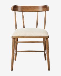 a wooden chair with a beige seat and back cushion on a white background, side view