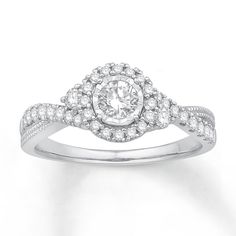 a diamond ring with two rows of diamonds around it