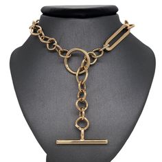 𝓦𝓮𝓵𝓬𝓸𝓶𝓮 ♥ Our stunning trombone toggle chain handcrafted in 14K Italian Gold. This gorgeous chain comes in yellow gold with toggle closure. The chain has mixed links of oval, rectangular, and ring links, measurements are listed below. The chain is truly a statement piece and elegant on its own, or can be layered with other charms and chains.   *Please check measurements below, items may appear larger on the screen. MEASUERMENTS  Ring link: 8.7mm Oval link: 9.2mm W x 13.7mm L Rectangular link: 7.6mm W x 31.6mm L  Length: 18.5" Adjustable  ITEM DETAILS  Made to Order/Custom Order 14-karat Gold Arrives in a Beautiful Jewelry Box. PRODUCT LEAD TIME Most of our products are 'made to order' resulting in different lead times.  If the piece is in stock, we ship immediately, but if we do not Formal Toggle Necklace With Chunky Link Chain, Yellow Gold Toggle Necklace With Chunky Link Chain, Luxury Link Chain Necklace With Toggle Clasp, Yellow Gold Chain Link Toggle Necklace, Yellow Gold Link Toggle Necklace For Formal Occasions, Formal Gold-tone Toggle Chain Link Necklace, Formal Toggle Clasp Chain Link Necklace, Formal Yellow Gold Link Toggle Necklace, Gold-tone Link Toggle Necklace