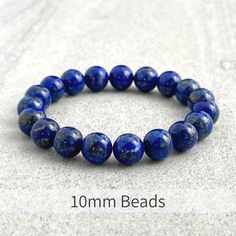 Men's beaded bracelet features: ~ 6mm, 8mm or 10mm lapis lazuli beads ~ 6mm, 8mm or 10mm onyx beads ~ 6mm, 8mm or 10mm hematite beads ~ Stretchy cord; simply slide bracelet on and off wrist ~ Comes packaged in a re-usable micro fibre pouch To ensure the perfect fit, please use the bracelet sizing instructions found in the photo gallery. Polished Beads Lapis Lazuli Round Bracelets, Round Lapis Lazuli Bracelets With Polished Beads, Polished Beads Lapis Lazuli Bracelets, Adjustable Lapis Lazuli Bracelet With 8mm Beads, Lapis Lazuli Beaded Bracelets With Polished Round Beads, Blue Lapis Lazuli Beaded Bracelets, Adjustable Lapis Lazuli Stretch Bracelet With Round Beads, Lapis Lazuli Beaded Bracelets With Gemstone, Lapis Lazuli Gemstone Beaded Bracelets