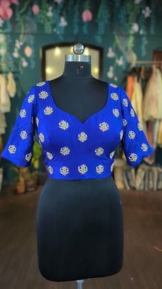 Royal blue rawsilk hand embroidered blouse with all over zardosi embroidery  size: please choose the size from the drop down. if you want custom measurements,  I'll send you the measurements sheet when you order.  Please contact me if you have any questions Blue Traditional Drape Top For Reception, Blue Tops For Reception With Traditional Drape, Anarkali Top With Resham Embroidery For Reception, Blue Traditional Drape Top For Wedding, Blue Silk Traditional Wear With Dori Work, Blue Blouse Piece With Floral Embroidery For Party, Blue Party Blouse With Floral Embroidery, Blue Embroidered Blouse For Reception, Fitted Tops With Intricate Embroidery In Traditional Drape