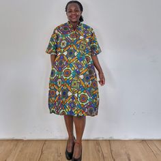 The jazzy dress is fun! Our loose fit colourful dresses made out of non-stretchy African print are perfect for you in case you are looking for a style idea that is versatile, comfortable, and looks fabulous year-round. All materials used to design the dresses are sourced in Kenya.  MEASUREMENT GUIDE:  We recommend asking questions about sizes or you can take your own measurements (at the bust) if unsafe. Since its an A- Line, you only need to ensure that you have the right fit for the bust. Plea Casual Multicolor Printed Shirt Dress, Casual Abstract Print Dress With Short Sleeves, Short Sleeve Multicolor Graphic Print Dress, Casual Knee-length Dress With Colorful Pattern, Casual Multicolor Bold Print Dresses, Casual Multicolor Dresses With Bold Print, Casual Multicolor Dress With Bold Print, Casual Multicolor Knee-length Shirt Dress, Multicolor Graphic Print Short Sleeve Dress