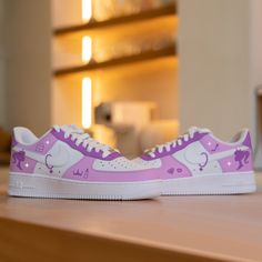 "Step up your sneaker game with the Custom Purple Girly Nike Air Force 1! Designed for bold risk-takers, these sneakers combine ultimate style with comfort. Stand out from the crowd and conquer any challenge with these statement-making kicks!" 🔥 100% genuine, Brand New.👟 Custom sneakers.★Every pair is hand-made and unique.✨Best quality waterproof and scratch-proof paints used.🎉 1000+ satisfied customers across various platforms.🎁 Treat the shoes as art as they are delicate and special.💌 We Sneakers Customized, Unique Sneakers, Air Force 1 Custom, Custom Air Force 1, 1 Birthday, Lv Shoes, Nike Brand, Sneaker Games, Custom Sneakers