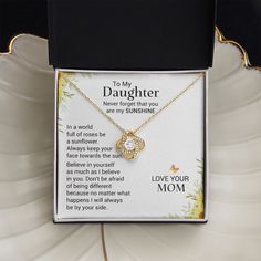 Imagine the joy on her face as she receives this beautiful Love Knot Necklace – a symbol of the unbreakable bond between two souls. This stunning piece is adorned with premium cubic zirconia crystals, making it the perfect gift for a bonus daughter or stepdaughter. Whether for a birthday, holiday, or special occasion, surprise her with this meaningful necklace today! Material Options: 14k white gold over stainless steel or 18k yellow gold over stainless steel Stone: 6mm round-cut cubic zirconia Rose Gold Jewelry With Gift Box For Birthday, Elegant Gold Plated Jewelry For Birthday Gift, Personalized Diamond Jewelry For Mother's Day, Inspirational Birthstone Jewelry For Gifts, Inspirational Birthstone Jewelry Gift, Gold Plated Jewelry Gift For Mother's Day, Mother's Day Inspirational Jewelry With Gift Box, Inspirational Jewelry For Mother's Day With Gift Box, Mother's Day Gold Jewelry With Diamond Accents