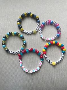 PLEASE READ FULL DESCRIPTION Let's trade friendship bracelets at Conan Gray's Found Heaven on Tour! Unique and high-quality bracelets for you to either wear or share during the concert. Keep what you love and trade what you don't! They're the perfect addition to any Found Heaven tour outfit! Randomly chosen for each order. No duplicates in an order. Customization possible upon request. Customization: let me know your favorite songs, album, phrases, inside jokes, or colors and I'll include a personalized mix for you! Bracelets are approximately between 6.5-7.5 inches but let me know if you would like them smaller or bigger sizes All bracelets are made with pony beads, letter beads and clear stretch cord. Designed for easy trading and swapping, but please be careful when pulling them on or o Heathers Bracelets, Found Heaven Bracelet, Customized Multicolor Friendship Jewelry, Customized Multicolor Jewelry For Friendship, Handmade Inspirational Bracelets For Friendship, Casual Multicolor Jewelry For Best Friend Gift, Multicolor Bracelet Jewelry As Best Friend Gift, Multicolor Inspirational Jewelry For Friendship, Inspirational Multicolor Bracelet Jewelry