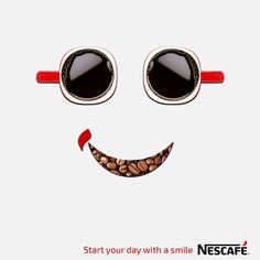 a smiling face wearing sunglasses with coffee beans in the shape of a smile on it