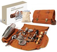 an assortment of kitchen utensils in a leather case with the contents laid out