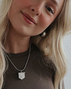 Alicia is a fun silver and marble pendant necklace that is easy to wear and layer! • Length: 16" + 2" chain extender• Waterproof Chain• Tarnish resistant• Stainless steel• HypoallergenicCare tips:• Store jewelry in our cloth Béljoy bag or a small plastic zip lock• Use a jewelry cloth to clean everyday oils off• Avoid contact with chemicals such as hairspray, lotions, perfumes, etc. Trendy Silver Charm Necklace With Round Pendant, Trendy Silver Charm Necklace For Everyday, Trendy Nickel-free Sterling Silver Charm Necklaces, Casual Everyday Necklace With Silver Chain, Casual Silver Chain Necklace For Everyday Wear, Casual Everyday Silver Chain Necklace, Trendy Sterling Silver Charm Necklaces For Everyday, Trendy Silver Hypoallergenic Charm Necklace, Trendy Hypoallergenic Silver Charm Necklace