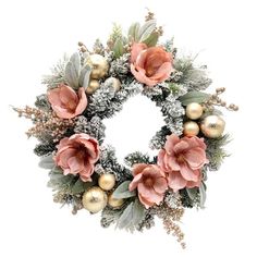 a christmas wreath with pink flowers and greenery