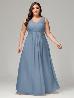 a woman in a long blue dress