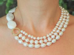 Pearl necklace will be one of the most beautiful piece of your jewelry collection. It is the combination of baroque freshwater pearl beads and white howlite beads. You can wear your necklace in your special days and in your daily life. You will draw all the attention to your pearl necklace and you will never want to settle with one as well. It is also a stylish gift for your friends on their special days. All of the necklaces will be sent in a gift box with free. So they will be ready to give as White Baroque Pearl Jewelry With Natural Stones, White Round Pearl Necklace With Natural Stones, White Pearl Necklace With Natural Stones, White Pearl Beaded Necklace In Rondelle Shape, White Pearl Beaded Necklaces In Rondelle Shape, White Pearl Necklace With Rondelle Gemstone Beads, White Pearl Rondelle Necklace With Gemstone Beads, White Gemstone Beads Jewelry For Wedding, Wedding Pearl Necklaces With Gemstone Beads