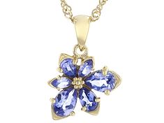 0.99ctw pear shape and .12ctw marquise tanzanite 18k yellow gold over sterling silver asymmetrical flower pendant with 18" Singapore chain. Measures approximately .73"L x .53"W. 3.1mm bail. Lobster claw clasp with a 2" extender. Elegant Pear-shaped Birthstone Jewelry, Formal Pear-shaped Birthstone Jewelry, Marquise Yellow Gold Jewelry Gift, Marquise Yellow Gold Jewelry As A Gift, Marquise Yellow Gold Jewelry For Gift, Yellow Gold Marquise Jewelry For Gifts, Gold Pear-shaped Gemstone Jewelry, Flower Shaped Jewelry With Prong Setting For Gifts, Formal Flower Shaped Jewelry With Prong Setting