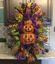 a halloween wreath on top of a kitchen counter