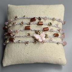 Women's Wrap Bracelet Light Gray Gold Blush Pink Beads Butterfly Handmade Cute Perfect For The Butterfly Lover. One Of A Kind Wrap Bracelet With Button Closure. Great Lightweight Piece To Wear Layered With Other Accessories. Very Versatile, Shown As An Anklet As Well. Makes A Great Gift. 38 In. Total Length. Designed And Handmade In Las Vegas, Nevada I'd Love To Accept Your Offer! Smoke-Free Seller. Fast Shipping. Trusted Long-Time Seller. All Items Are In Euc Unless Otherwise Stated. Thank You Beaded Wrap Bracelet As Gift, Adjustable Pink Gold Beaded Bracelets, Multi-strand Beaded Bracelets For Jewelry Making, Adjustable Pink Gold Beaded Bracelet, Adjustable Pink Beaded Jewelry, Pink Tiny Beaded Bracelets For Party, Beige Beaded Bracelets As A Gift, Pink Wrap Bracelet With Round Beads For Gifts, Beaded Pink Wrap Bracelet Gift