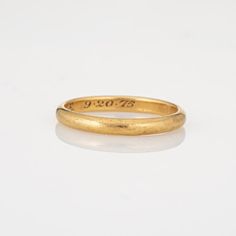 Vintage Cartier wedding band crafted in 18k yellow gold.    The classic Cartier band is 3mm wide and ideal worn as a wedding band or ring for everyday wear.   The ring is in good condition with light wear evident (light surface abrasions visible under a 10x loupe). We have not cleaned the ring in order to preserve the patina and collector value.  Particulars:  Weight: 4.2 grammes  Stones:  N/A  Size & Measurements: The ring is a size 10 1/4 (can be resized). The band measures 3mm wide (0.11 inch Classic Cartier Ring For Promise, Classic Cartier Promise Ring, Cartier Classic Promise Ring, Gold Stackable Round Band Rings For Marriage, Gold Stackable Rings For Marriage, Classic Cartier Ring, Classic Engraved Round Band Ring For Marriage, Classic Engraved Ring With Round Band For Marriage, Classic Yellow Gold Bands For Promise Ring