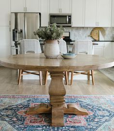 The perfect family table for a quick breakfast or formal dining meal. Made from solid pine and mahogany wood, this rough sawn dining table features solid craftsmanship with individual plank pieces, finished with a rustic smoke color glaze for a slightly aged look. Comfortably seats 4-6 depending on the dining chair. Dimensions: 30 in H x 59.75 in D Shipping is not available for this item. Local pick up & delivery are available for Utah customers. Have questions? Visit our FAQ page. Round Kitchen Table And Chairs Wood, Coastal Farmhouse Round Dining Table, Round French Country Dining Table, Round Oak Dining Table And Chairs, 60 In Round Dining Table, Round French Dining Table, Dining Room Round Table Design, Light Brown Round Dining Table, Popular Dining Room Tables