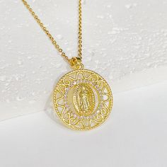 Experience the power of faith and divine protection under the devotional protection of the Blessed Virgin Mary. The Virgin Mary will always watch over and protect you, and you will be inspired and empowered. The Religious Virgin Mary Gold Virgencita Necklace is displayed with beautiful attention to detail. The pendant has a beautifully designed texture that makes the image come out and has everything you would want in a Virgin Mary Virgencita Necklace. Make a statement and show your devotion wit Virgencita Necklace, Blessed Family, Divine Protection, Virgin Mary Necklace, Hari Valentine, Valentines Day Presents, Confirmation Gifts, Blessed Virgin, Blessed Virgin Mary