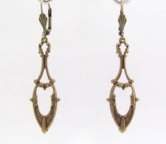 "Art Nouveau Earrings Antiqued golden brass Earrings. Fabulous long dangle Art Nouveau design earrings. Antiqued Brass, nickel free. Measure 2-1/4\" top to bottom. I am happy to switch to french ear wires or clip on if you prefer. Lever back design may vary. Dramatic Beauty...these can be worn every day to Wedding day! Sent to you with Aloha! More of my Artisan Jewelry: hawaiibeads.etsy.com" Dangle Art, Nouveau Earrings, Art Nouveau Earrings, Art Nouveau Earring, Earrings Chandelier, Deco Earrings, Earrings Art, Art Nouveau Design, Art Deco Earrings