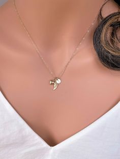 14k solid gold Angle wing , Tiny Initial charm & heart necklace. The best gift for Pet lover necklace . All components onto 14k solid gold . it consists of .. -14k Solid Gold 6.4mm initial charm , 14.5 x 5.3mm Angle wing charm and 11.3 x 6.3mm little puff heart are attached onto -14k Solid yellow gold baby Box chain or Cable chain or Rope chain , -Come up with beautiful jewelry gift box and -One set of Care instruction package . MORE Solid GOLD JEWELRY https://www.etsy.com/shop/rainbowearrin 14k Gold Filled Pendant Charm Necklace As Gift, 14k Gold Filled Pendant Charm Necklace For Gift, 14k Gold Filled Charms Jewelry As Gift, 14k Gold-filled Pendant Charm Necklace For Gift, 14k Gold-filled Charms Jewelry As Gift, 14k Gold Tarnish-resistant Charm Necklace Gift For Her, 14k Gold Tarnish-resistant Charm Necklace For Her, Fine Jewelry Charm Necklace With Heart Charm As Gift, 14k Gold Heart Pendant Jewelry Gift