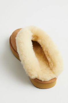 click to expand Faux Fur Lined Slippers, Shearling Slippers For Indoor Winter Use, Indoor Slippers With Plush Lining In Sheepskin, Cozy Sheepskin Slippers For Indoor Use, Shearling Slippers With Rubber Sole And Closed Toe, Sheepskin Slippers With Plush Lining And Round Toe, Sheepskin Slippers With Rubber Sole And Round Toe, Shearling Slippers With Faux Fur Lining And Round Toe, Winter Sheepskin Slippers With Rubber Sole