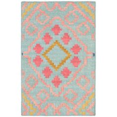 a blue rug with pink, yellow and orange designs