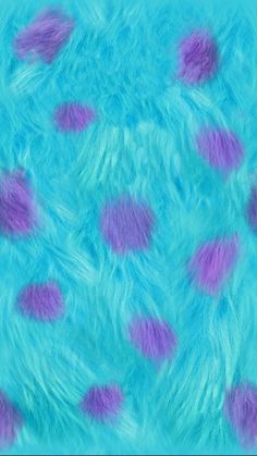 an abstract blue and purple background with lots of feathers