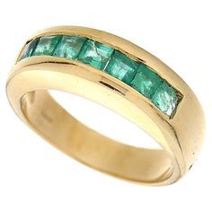 Band ring made of 18kt yellow gold with natural carré-cut emeralds Welcome to our jewelry collection, where every piece tells a story of timeless elegance and unparalleled craftsmanship. As a family-run business in Italy for over 100 years, we pride ourselves on creating exceptional jewelry that is not only beautiful, but also embodies the rich history and culture of our country. We understand that purchasing jewelry is an investment, which is why we are dedicated to providing you with the best Collectible Yellow Gold Emerald Ring With Cabochon, Collectible Yellow Gold Emerald Cabochon Ring, 14k Gold Cabochon Emerald Ring, Vintage Multi-stone Emerald Ring In 14k Gold, Unique Cabochon Emerald Ring, Collectible, Gold Vintage Ring, Vintage Ring, Cocktail Rings, Band Ring