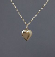 Tiny Gold Heart Locket Necklace Dainty 14k Gold Locket Necklace, Gold Heart Locket Necklace 14k, Gold Heart Locket Necklace In 14k Gold, Gold 14k Locket Heart Necklace, Gold Minimalist Necklace For Keepsake, Simple Gold Charm Necklaces With Heart Pendant, Everyday Gold Pendant Locket Necklace, Simple Gold Charm Necklace With Heart Pendant, Dainty Locket Necklace For Everyday