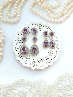 Simply elegant - big & beautiful amethyst crystal earrings with water drop pendant. There are two styles - smaller and more delicate delicate earrings - and longer earrings - rather statement earring without being too big. With classic design, beautiful purple and white stones shining in the light, they really are special. Perfect for a bride, bridesmaid or any special occasion to add some diamond glamour. Purple Crystal Earrings For Wedding, Elegant Lavender Crystal Earrings For Party, Formal Lavender Earrings, Elegant Purple Dangle Chandelier Earrings, Elegant Purple Gemstone Chandelier Earrings, Elegant Amethyst Teardrop Dangle Earrings, Elegant Purple Earrings For Pierced Ears, Elegant Lavender Earrings For Party, Elegant Purple Long Drop Jewelry