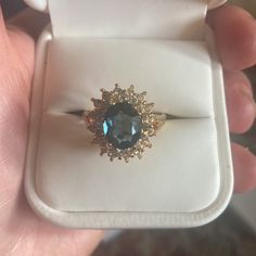 Gorgeous 14k Gold And Blue Sapphire Center Stone. Diamonds On The Outside. Never Worn, In Original White Leather Ring Box With Ravello Signage And White Box. Would Make Excellent Gift As New And All Intact Casings. Got This From My Mom. Looks Very Exquisite And Expensive, Quality. Added Pics Form Website To See The Brand/Qualities. Please Look Up Ravello Beverly Hills For Info On The Brand. Luxury 14k Gold Cluster Ring With Accent Stones, Luxury Cluster Ring With Accent Stones In 14k Gold, Sapphire Cluster Ring For Formal Occasions, Formal Sapphire Cluster Ring With High Clarity, Yellow Gold Sapphire Jewelry With Halo Setting, Yellow Gold Sapphire Jewelry For Proposal, Gold Gemstone Cluster Ring For Proposal, Classic Jewelry For Proposal With Accent Stones, Classic Proposal Jewelry With Accent Stones