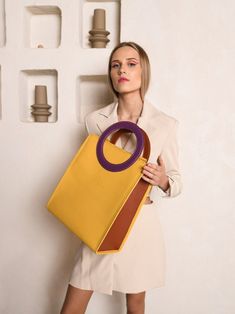 Handbag with round handles, summer office bag, Large shoulder purse for women. This lightweight yellow handbag is the perfect bag for work and the best choice for summer handbag. Spacious handbag Buttercup - harmony and ingenious minimalism.  ▪️  Inside the bag - dirt resistant  lining and one zippered leather pocket for phone/keys; ▪️  Handbag safely closes with zipper; ▪️  It has one detachable strap, which is 1 meter long; ▪️  Measurements: 13.8 x 11.8 x 5.9 in (35 x 30 x 15 cm.) COLOR: We ca Summer Handbag, Summer Office, Summer Handbags, Yellow Handbag, Office Bag, Purse For Women, Leather Pocket, Gift For Wife, Color Free