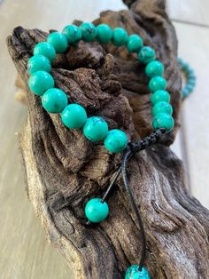 Beautiful Pine Stone bracelets. Smallest adjusted size -14cm circumference. Offered In 2 colors-teal/ darker turquoise and light turquoise. Personalisation is optional-stainless steel initials (in the picture). Gift Wrapping available for additional $1.85 Please click here: https://www.etsy.com/listing/1345522559/gift-wrapping-options?ref=listing_published_alert Turquoise Adjustable Friendship Bracelet, Turquoise Adjustable Friendship Bracelets, Adjustable Turquoise Friendship Bracelet, Adjustable Turquoise Jewelry Gift, Adjustable Turquoise Bracelets, Adjustable Turquoise Friendship Bracelets With Sliding Knot, Adjustable Turquoise Resizable Bracelet, Adjustable Turquoise Hand-strung Beaded Bracelets, Adjustable Hand-strung Turquoise Beaded Bracelets