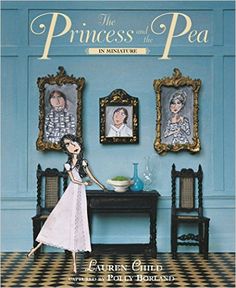 the princess and the frog book cover with an image of a doll in front of two framed pictures