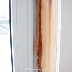 a piece of wood sticking out of the side of a door