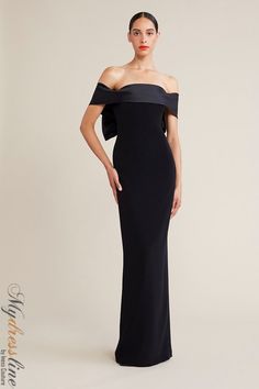 Looking for a show-stopping gown that is sure to turn heads? Look no further than the Audrey+Brooks 6205 Off-the-shoulder Gown. This gorgeous dress features a satin organza contrast wide collar with back bow and train, mermaid silhouette, hidden back zipper, and satin lined. Made from 80% TRIACETATE and 20% POLYESTER, this dress is sure to be a hit at your next event! Long Black Gowns Elegant, Off Shoulders Long Dress, Black Tie Gown Wedding, Floor-length Evening Dress For Wedding With Flattering Silhouette, Luxury Evening Dress With Fitted Bodice For Formal Occasions, Luxury Formal Evening Dress With Fitted Bodice, Luxury Evening Dress For Formal Occasions, Elegant Floor-length Evening Dress For Gala, Elegant Formal Gown With Fitted Bodice