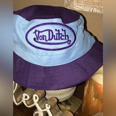 Von Dutch Childs Hat Nwot Casual Purple Bucket Hat For Spring, Trendy Purple Bucket Hat With Curved Brim, Casual Purple Cotton Bucket Hat, Casual Purple Hat For Streetwear, Trendy Purple Bucket Hat, Purple Outdoor Hat For Spring, Purple Outdoor Hats For Spring, Purple Spring Outdoor Hat, Casual Purple Bucket Hat With Curved Brim