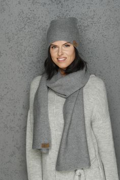 "THE SET of the GRAY snood and cap - warm, soft merino wool garment. Luxury and exclusive accessory. Snood and cap are made of very luxury merino wool yarn, thats why it's very soft. This garment is suitable even for the alergic people. Because of the knitting print, this cap will fit both - small and big headed people. It doesn't loses form wearing it. Composition - 70% merino wool, 30% alpaca wool. Dimensions: Scarf - Width- 30 cm / 11,81\", length - 185 cm/ 72,83\". Cap - Width- 42 cm/ 16,54\ Winter Scarf Gift, Cap Winter, Alpaca Cardigan, Wool Caps, Alpaca Sweater, Mohair Cardigan, Merino Wool Yarn, Knit Wrap, Scarf Gift