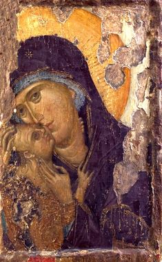 an icon of the virgin mary holding a child