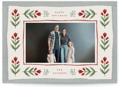 a family is posing for a holiday card