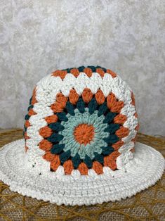 Beach Hat With Adjustable Crochet Lace, Beach Hat With Crochet Lace And Adjustable Fit, Casual Crochet Lace Hat For The Beach, Bohemian Adjustable Crochet Hat With Crochet Trim, Beach Crochet Hat Made Of Yarn, Adjustable Bohemian Crochet Hat With Crochet Trim, White Bohemian Brimmed Sun Hat, Adjustable Crochet Hat, White Bohemian Sun Hat