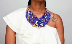 Meet "Itoro"! Her name means Praise in the African language. She is what we like to call a handmade beautiful mess of vibrant blue seed beads embellished with a variety of ethnic beads that adds a unique flare. She is the epitome of statement fashion jewelry that adds the perfect pop of color to any outfit. Pair her with a nice denim button-up top or solid color blouse of choice and you are sure to command any room you enter! Features: Blue; Multi-colored ethnic beads & shells; Silver fish h Artisan Blue Beaded Necklaces, Traditional Blue Beaded Necklaces For Party, Blue Beaded Necklace For Party, Blue Beads For Festivals, Bohemian Blue Beaded Necklaces With Gold Beads, Blue Beaded Necklace With Tiny Beads For Party, Blue Beaded Necklaces With Tiny Beads For Party, Artisan Blue Beaded Necklace With Tiny Beads, Blue Party Beaded Necklace With Tiny Beads