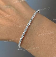 Oval Moissanite tennis bracelet,solid 14k gold bracelet,eternity moissanite bracelet,luxury   dainty,lab diamond tennis bracelet,wedding bracelet for women,aniversary gift DESCRIPTION  -------------------- *Moissanite Details  →Stone                            :oval  →Size (mm)                      :5*3 →Stone Total CTW          :5 to 7.76 →Color                              :Colorless →Clarity                            :VVS  *Lab Diamond Details  →Stone                            :oval  →Size Moissanite Bracelet, Aniversary Gifts, Gold Tennis Bracelet, Bracelet Luxury, Plus Size Rings, Bracelet Wedding, Oval Moissanite, Diamond Tennis Bracelet, Adjustable Jewelry