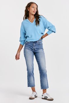 The 90s Jean in Mozzie presents a timeless style with a modern twist. Crafted from stretch denim with a high rise fit that sits slightly lower on the waist and fitted in the hips, these ankle skinnies promise a chic, sleek fit. 9 1/2" Front Rise (include waistband), 10" Leg Opening, 28" inseam (Size 27) 90% COTTON 8% POLYESTER 2% SPANDEX Machine wash cold, Tumble dry low Imported Zip fly and button closure Five-pocket style Trendy Mid-rise Jeans For Elevated Casual, Trendy Mid-rise Jeans For Elevated Casual Occasions, Trendy Medium Wash Cropped Jeans For Fall, Trendy Cropped Jeans In Medium Wash For Fall, Chic High Rise Jeans For Everyday, Mid-rise Denim Flare Jeans For Elevated Casual Occasions, Trendy Relaxed Fit Jeans For Elevated Casual, Trendy Relaxed Fit Jeans For Elevated Casual Occasions, Trendy High Rise Flare Jeans For Everyday