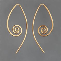 This unique spiral hoop earrings are handmade using Copper. The Length of the earrings is 1 3/4inches 45mm. ;-) My contact number: 626-379-1904. Please contact me if you would like to order multiples or customize a design for your special event, I will be pleased to give you a discount on a quantity order. ;-) Purchases will be shipped within 1-3 business days. In case of occasional shortage of beads material, purchases will be shipped in a week. Packages are shipped via USPS first-class mail wi Elegant Spiral Wire Wrapped Hoop Earrings, Unique Spiral Earrings For Gift, Handmade Gold Wrap Earrings For Weddings, Nickel Free Spiral Hoop Earrings Gift, Nickel-free Spiral Hoop Earrings As Gift, Spiral Earrings With Ear Wire As Gift, Spiral Earrings With Ear Wire For Gifts, Nickel-free Spiral Hoop Earrings For Gift, Handmade Wrap Earrings As Gift