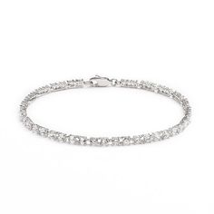 Bracelet Details: Length: 7.5-in. Clasp:box Metal: rhodium over silver-plated bronze Cubic Zirconia Details: Cut: round Color: white Setting: prong Size: One Size. Gender: female. Age Group: adult. Material: Silver Plate. Elegant Cubic Zirconia Crystal Bracelet With Diamond Cut, Elegant Cubic Zirconia Bracelet With Diamond Cut, Elegant Diamond Cut Cubic Zirconia Crystal Bracelet, Diamond Cut Cubic Zirconia Crystal Bracelet, Formal Cubic Zirconia Bracelet With Sparkling Stones, Formal Chain Bracelet With Sparkling Cubic Zirconia, White Cubic Zirconia Chain Bracelet For Formal Occasions, White Cubic Zirconia Jubilee Sterling Silver Bracelet, Formal White Cubic Zirconia Chain Bracelet