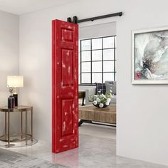 a red door is open in the middle of a room with white walls and marble flooring