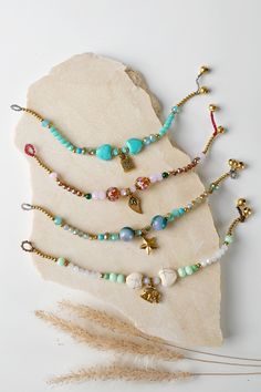 Bohemian Gemstone Beads Friendship Bracelets For Beach, Bohemian Gold Friendship Bracelets With Gemstone Beads, Adjustable Turquoise Crystal Bracelet In Bohemian Style, Bohemian Adjustable Turquoise Crystal Bracelet, Bohemian Gold Crystal Bracelet With Tiny Beads, Gold Bohemian Crystal Bracelet With Tiny Beads, Adjustable Turquoise Beaded Charm Bracelet, Bohemian Charm Bracelets For The Beach, Bohemian Charm Bracelet With Colorful Beads